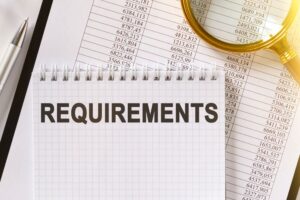 1031 Exchanges: What You Don’t Know will Cost You Thousands 2 REQUIREMENTS text in a notebook with lens